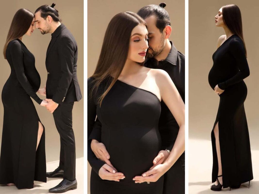Neha Rajpoot and Shahbaz Taseer embrace in a maternity photoshoot for BLACK GOWN.